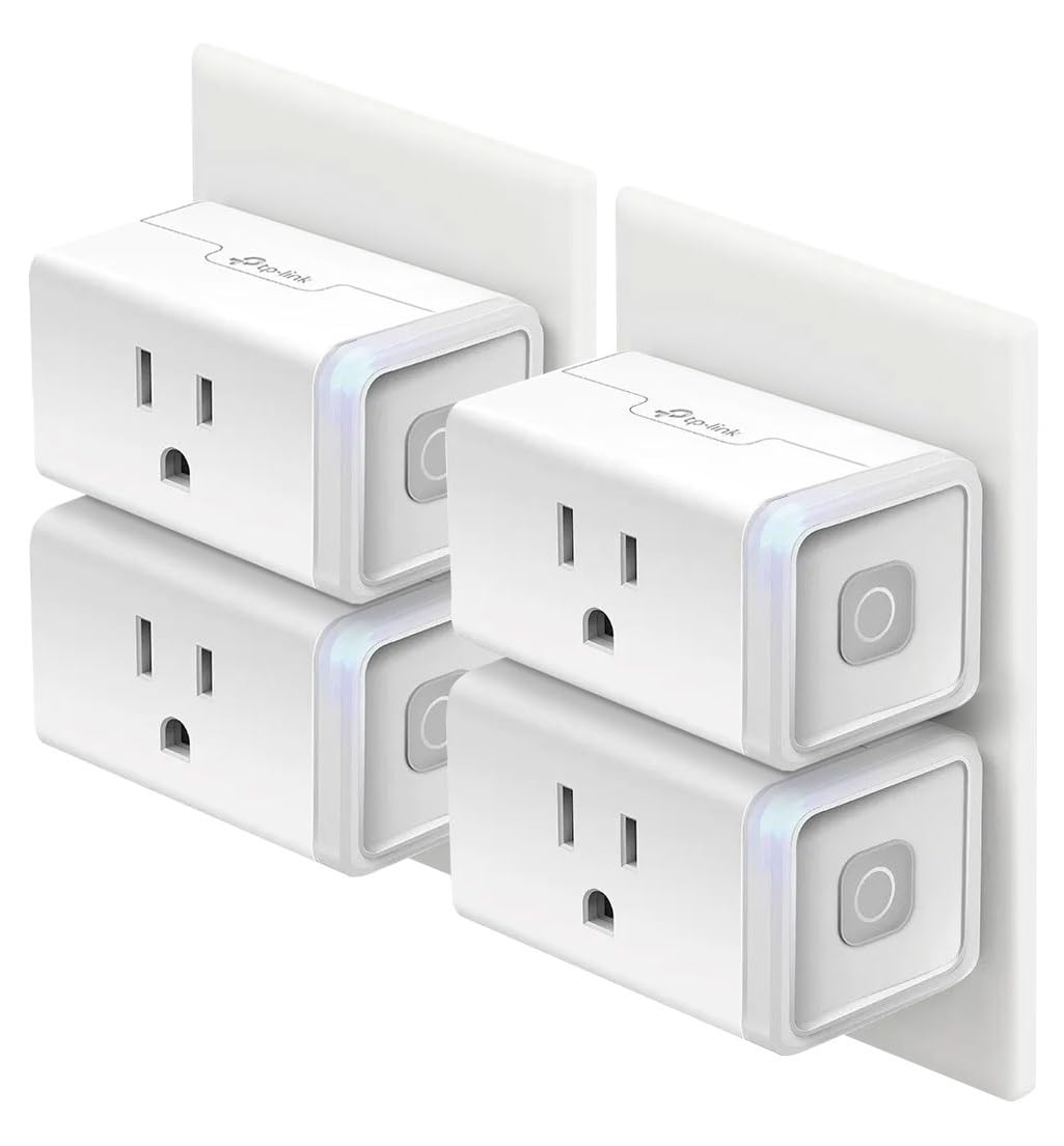 Four Kasa Smart HS103 white WiFi smart plugs on white background