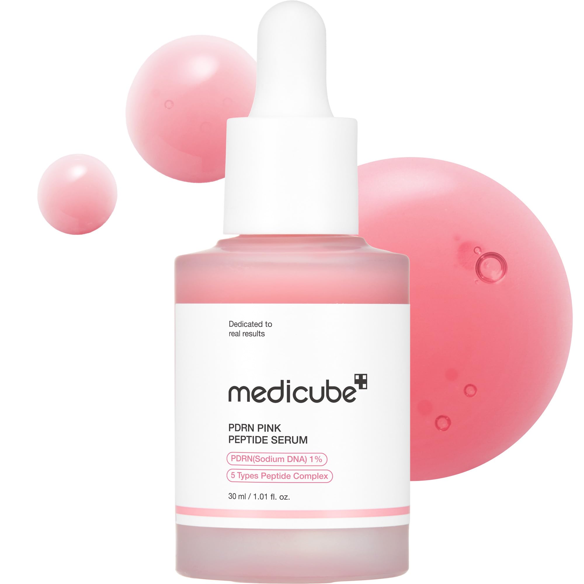 Bottle of medicube PDRN Pink Peptide Serum with dropper