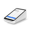 Square Terminal compact touchscreen card reader on countertop
