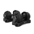 Pair of Bowflex SelectTech 552 adjustable dumbbells showing weight dials
