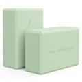 Two mint green Trideer foam yoga blocks showing soft non-slip surface