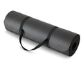 Black 1/2 inch extra thick exercise yoga mat rolled with carrying strap