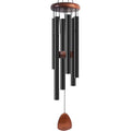 Bursvik 37-inch black aluminum wind chimes hanging on a patio