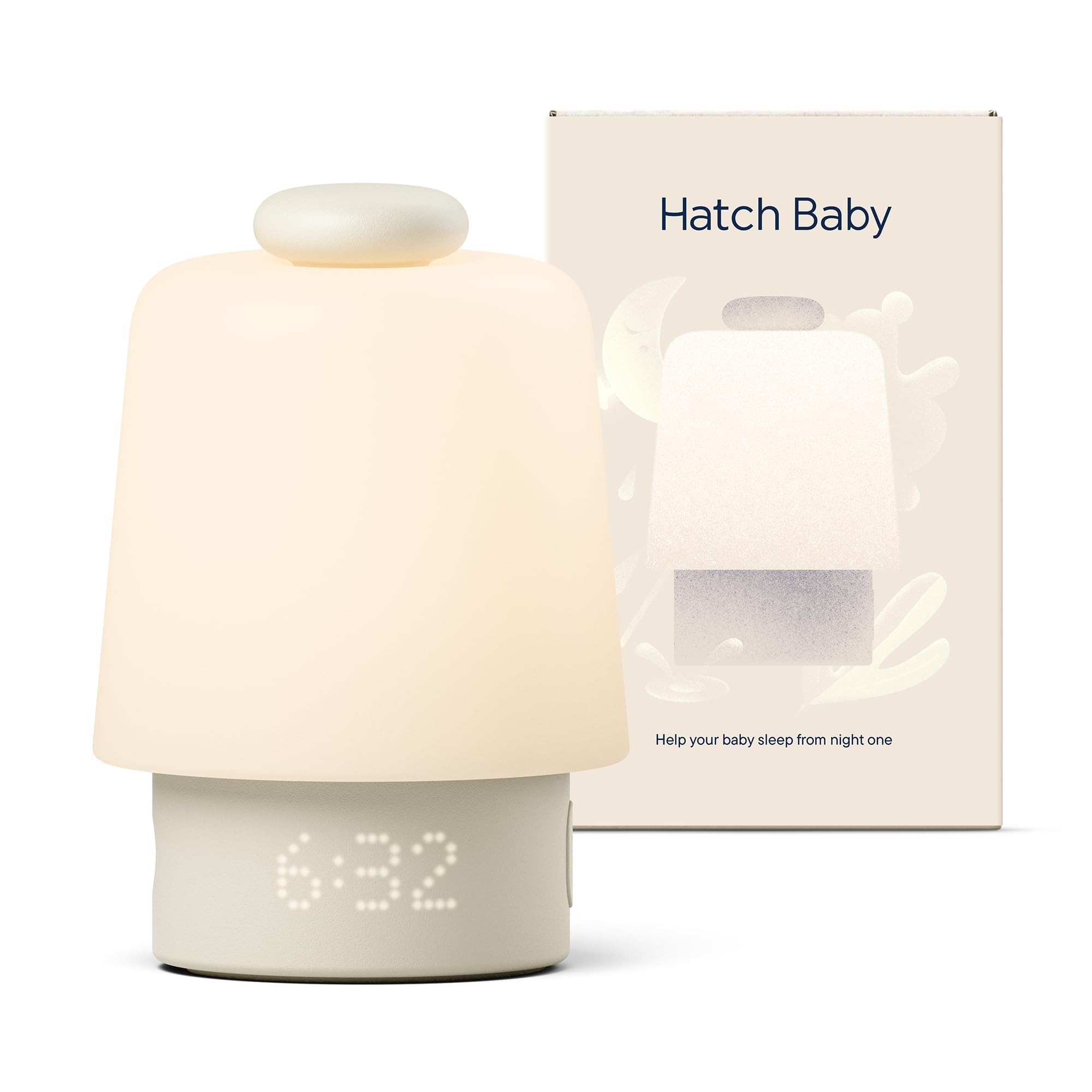 Hatch Baby Sound Machine & Night Light in putty on a nursery shelf
