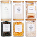 Six square 35oz clear glass storage jars with airtight bamboo lids and pantry labels