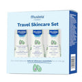 Three Mustela refillable 1.69 fl oz avocado travel skincare bottles