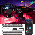 Govee RGB LED strip lights installed along a car interior footwell emitting blue and purple glow
