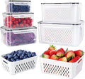 Freshmage large clear plastic fruit storage containers stacked in a refrigerator