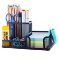 Black M&G three-compartment mesh pen holder with sticky notes slot on desk