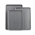 Three gray GoodCook nonstick baking sheets in small, medium, and large sizes