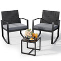 Grey cushioned Qsun rattan rocking bistro chairs and coffee table on patio