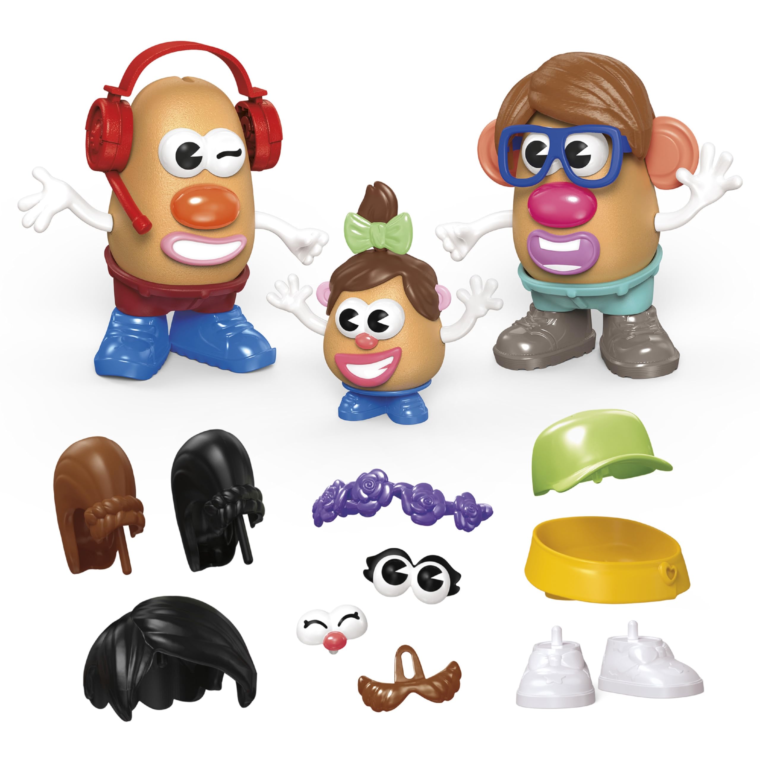 Mr. Potato Head Create Your Family figures with interchangeable parts arranged on a white background