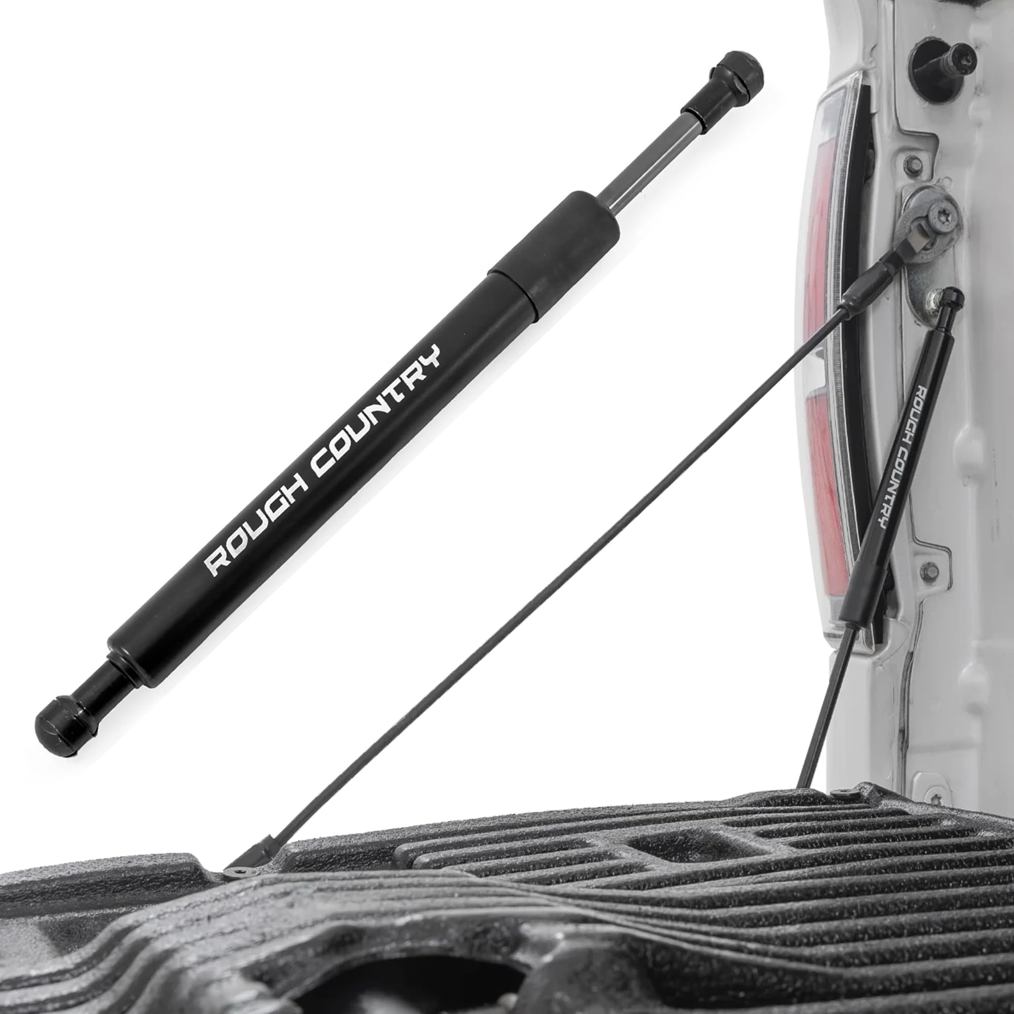 Rough Country tailgate assist gas strut installed on Ford F-150 tailgate