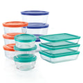 Pyrex Simply Store clear glass food storage containers with snap-on lids displayed on a kitchen counter