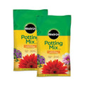 Two 16 qt bags of Miracle-Gro Potting Mix on white background