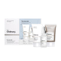 The Ordinary three-piece acne regimen: foaming cleanser bottle, salicylic acid dropper, moisturizer