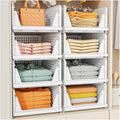 SNSLXH stackable closet organizer baskets stacked on a closet shelf