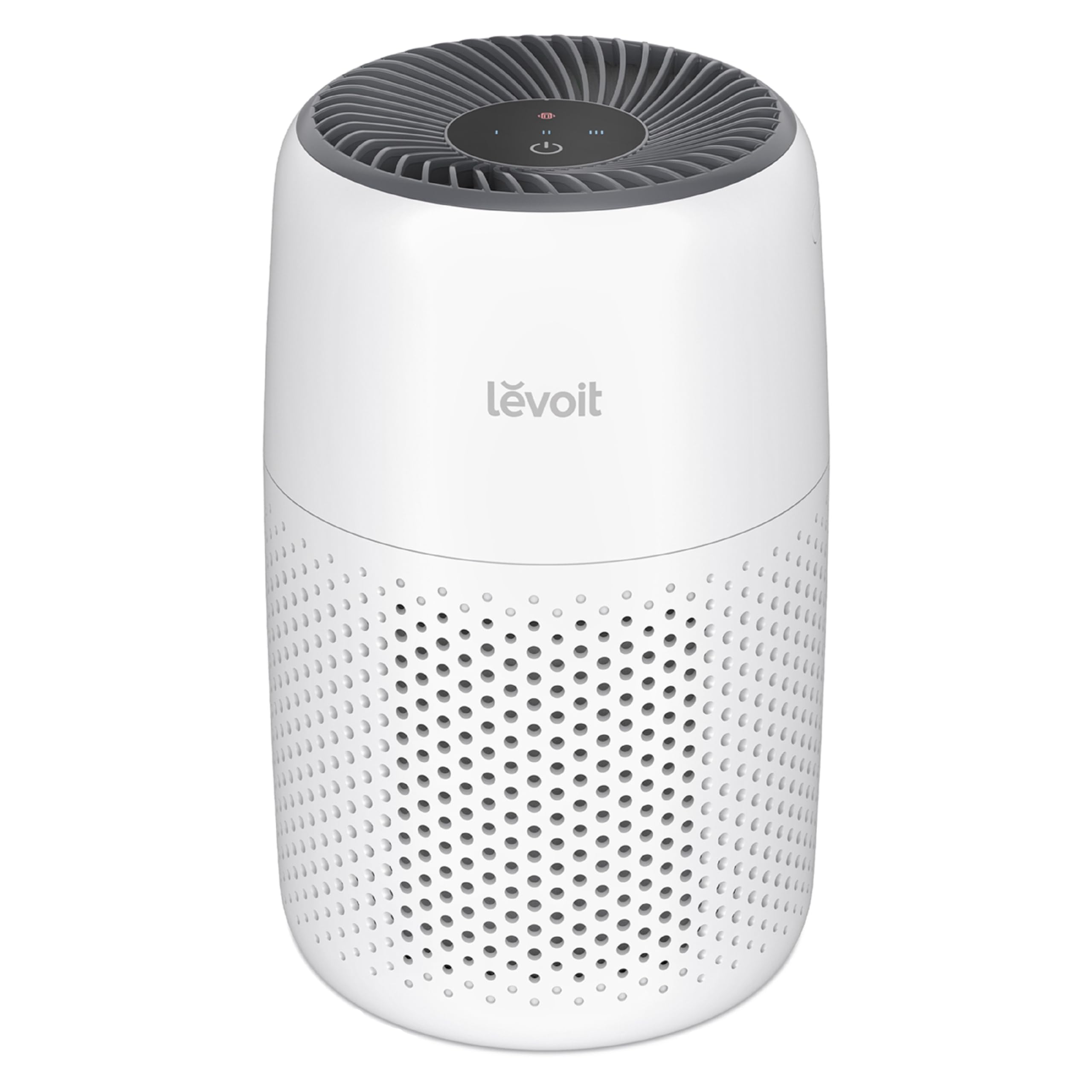 Levoit compact air purifier on a bedside table in a bedroom