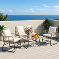 DUMOS 4-piece wicker patio furniture with chairs and coffee table on outdoor deck
