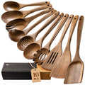 Ten acacia wood cooking spoons displayed on a countertop