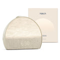 Hatch Baby Restore 3 putty sunrise alarm clock, sound machine showing soft warm light