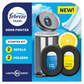 Febreze stick-on can deodorizer holders and refills in Lemon and Linen scents attached to a garbage can