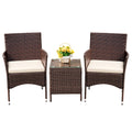 Brown Devoko 3-piece outdoor wicker seating, two chairs, glass-top table