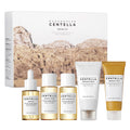 Five SKIN1004 Centella travel-size skincare bottles, tubes on white background