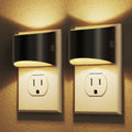 DORESshop white plug-in night light glowing warm 3000K plugged into wall outlet