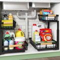 Black Kitstorack 2-tier metal slide-out under-sink organizer installed in cabinet