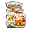 Five 22oz clear glass storage containers with grey lids on a kitchen counter
