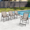 Beige Crestlive folding sling patio chair with armrests on deck