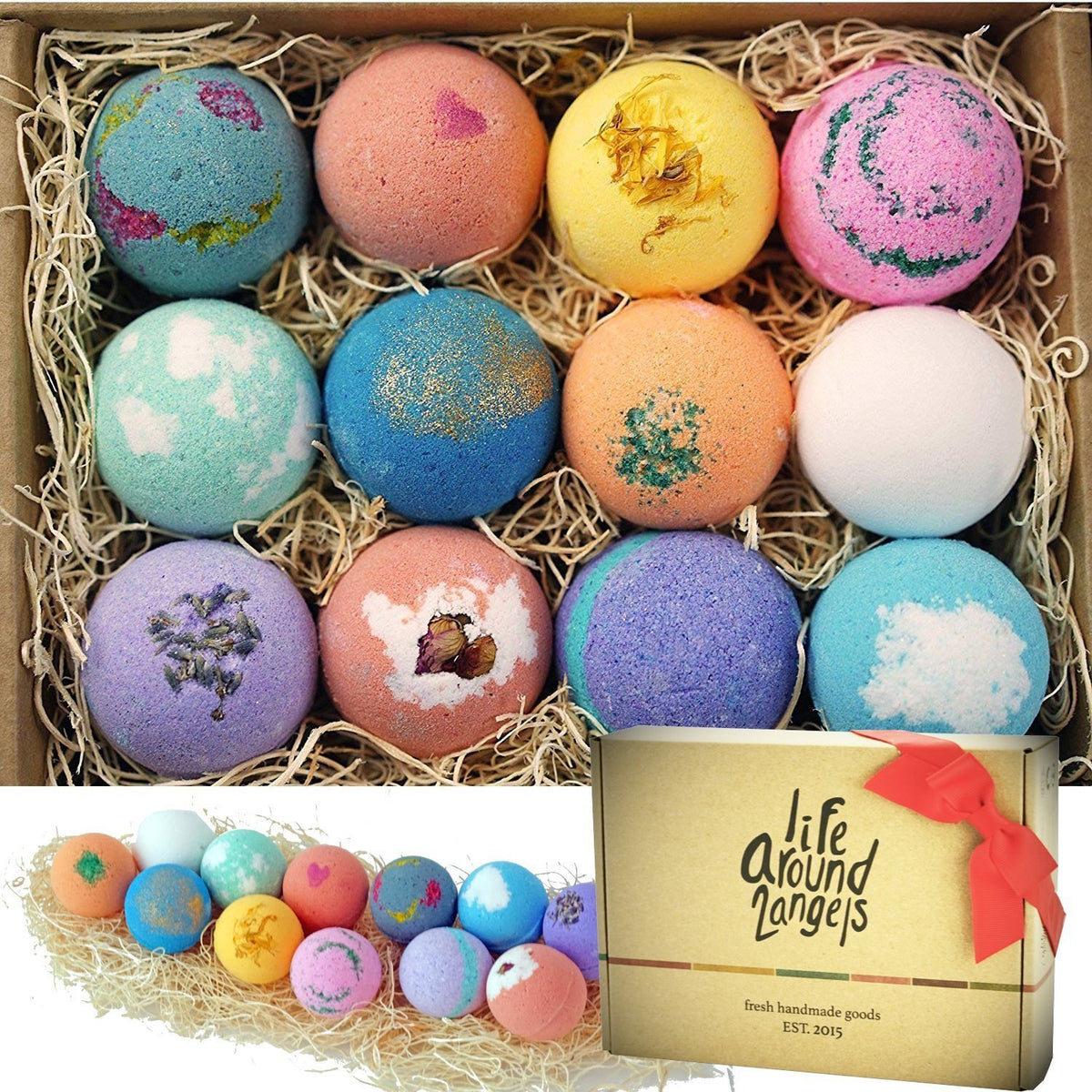 Twelve Lifearound2angels bath bombs arranged in a box showing shea cocoa butter labels