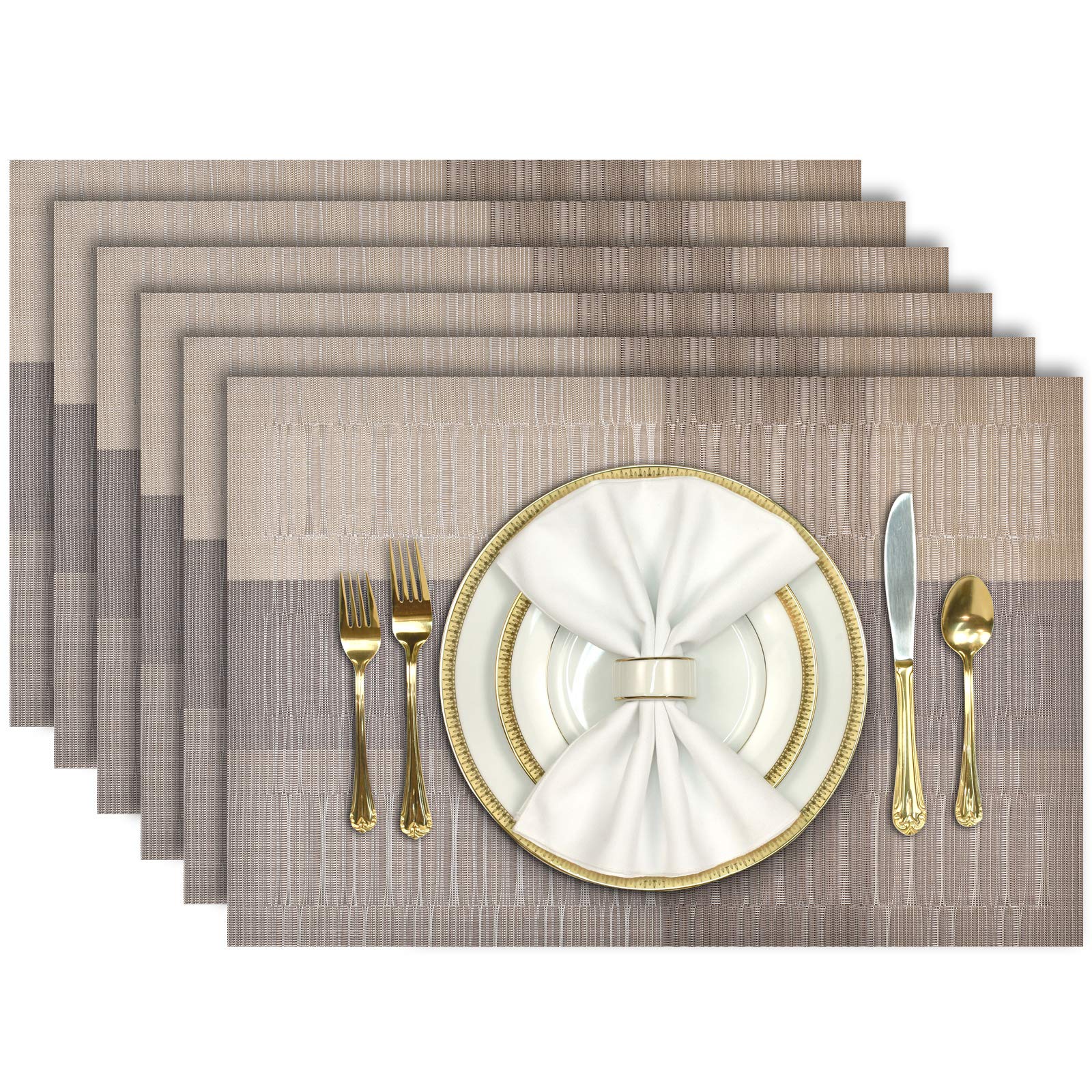 Aofmee woven vinyl placemats laid on a dining table, heat-resistant and washable